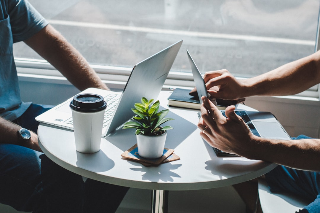 Laptops meeting in coffee shop